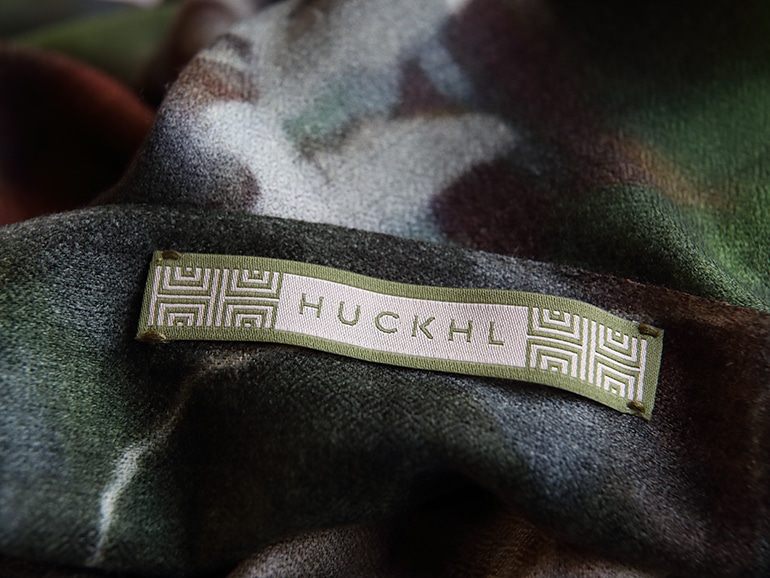 Huckhl embroidered scarf tag design