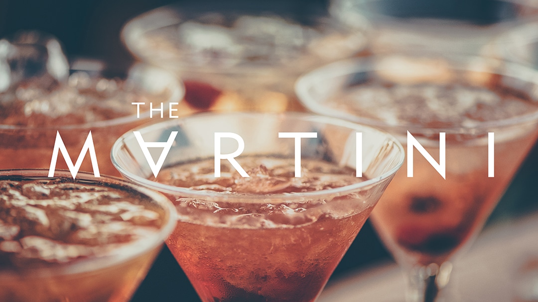 The Martini logo in white sitting over full-bleed image of martini glasses