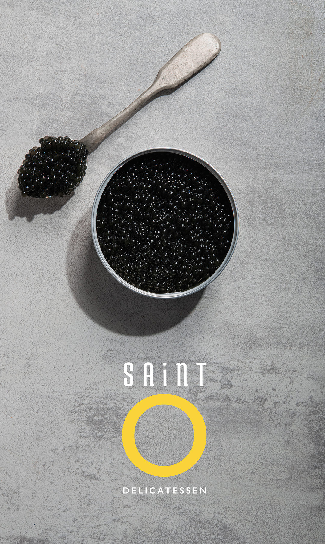 Saint O Delicatessen logo superimposed onto an image of black caviar