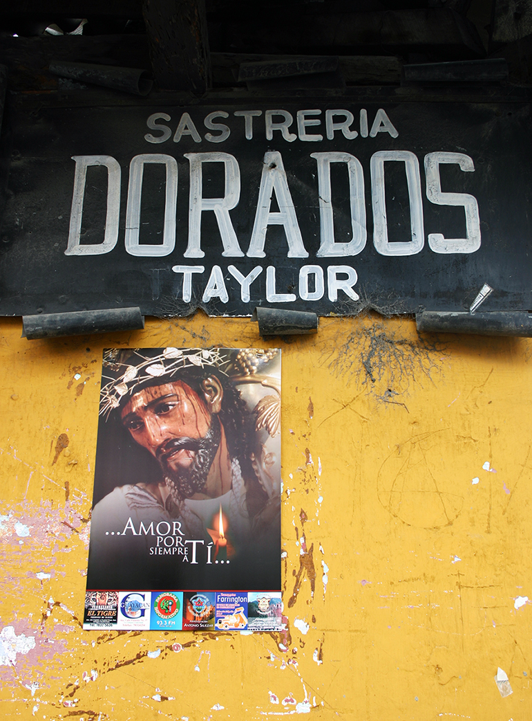 Wall sign in Mexico, photograph by Russ Smith