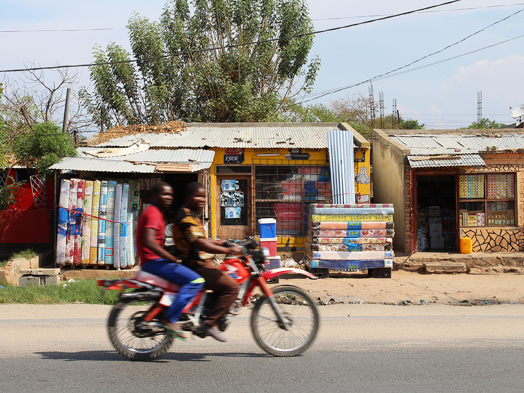 Motorcyclists in Mozambique, photograph by Russ Smith