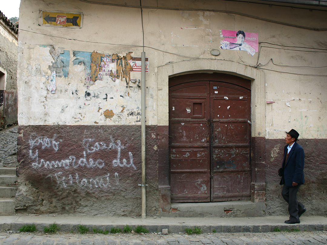 Man waling in La Paz, Bolivia, photograph by Russ Smith